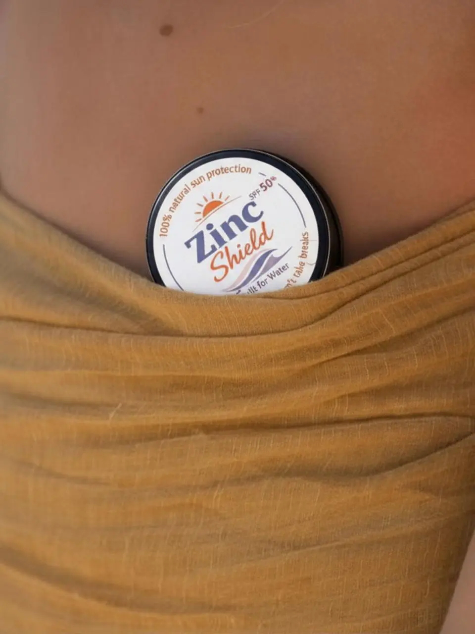 Zinc Shield natural zinc sunscreen tin carried in clothing - portable mineral sun protection